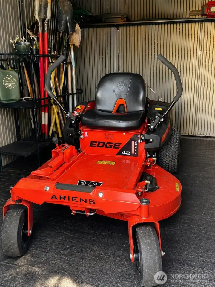 Like new zero-turn mower included.
