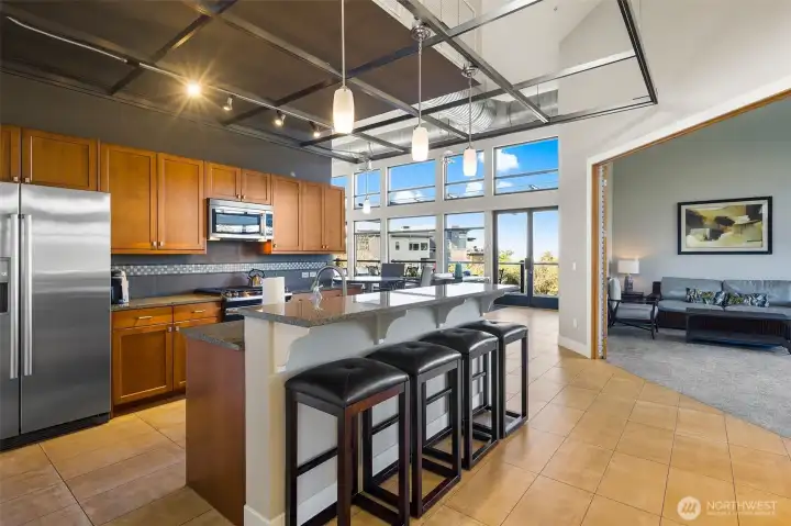 The upstairs of the Charter Club features a lounge area, full kitchen  . . .and