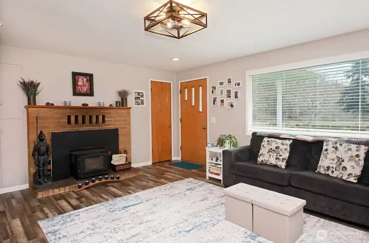 living room with wood fireplace