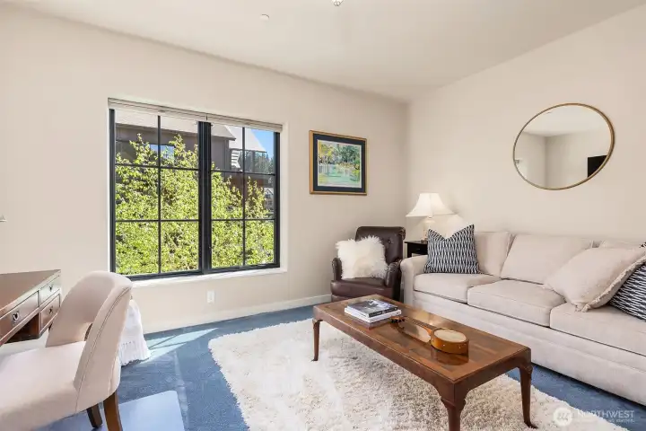 The third bedroom currently being used as a den and home office.