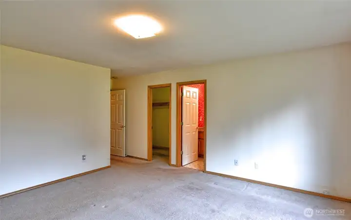 Walkin closet to the left bathroom to the right.