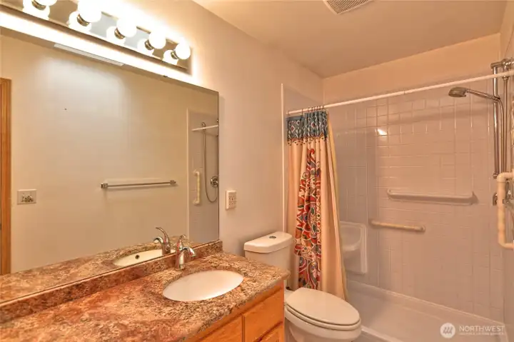 Primary bathroom huge shower.