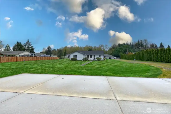 Patio of shop looking back at home.