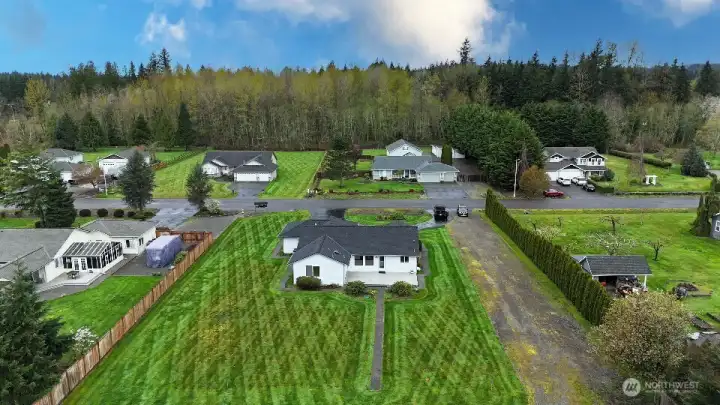 Home looking out through neighborhood nice homes