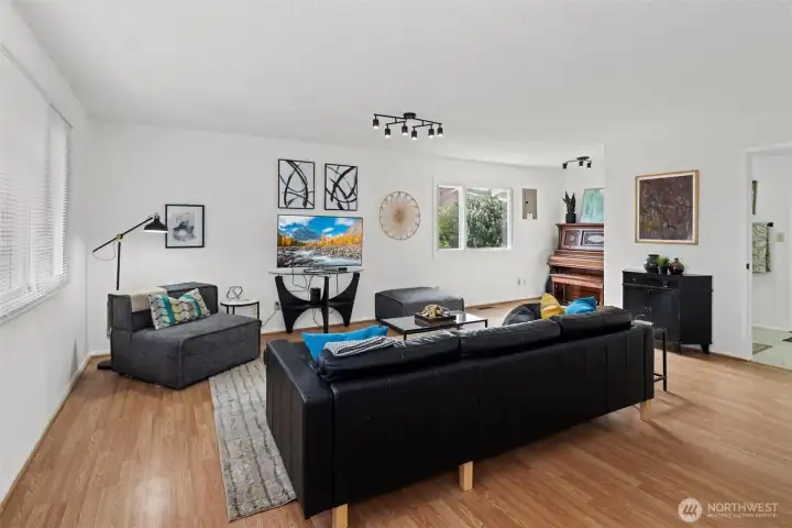 This family room easily flows from the dining area and kitchen.