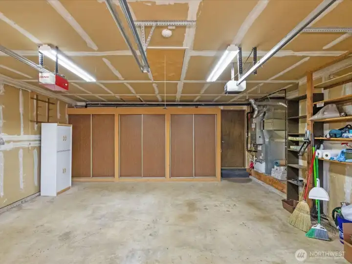 Look at all those storage cabnits in the 2 car garage