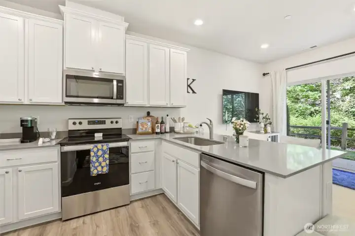Kitchen includes stainless appliances