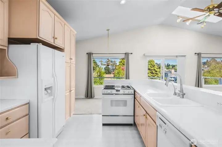 Kitchen is Light & Bright with Vaulted Ceilings & Skylights Kitchen is Light & Bright with Vaulted Ceilings & Skylights