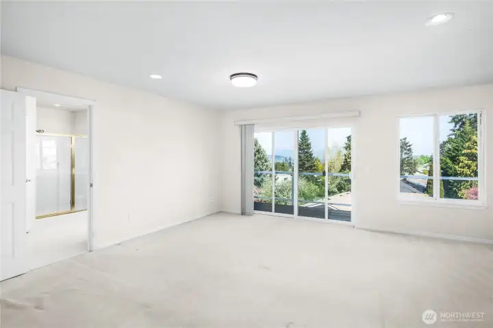 Primary Bedroom with Private Deck Primary Bedroom with Private Deck