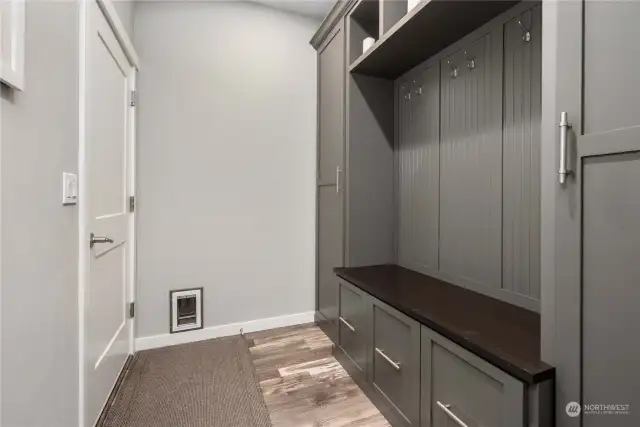 This was previously just a "drop your boots here" space going out to the garage and the seller had this gorgeous custom cubby built to fit the space.