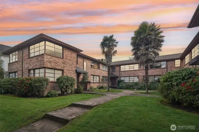A one-car garage with alley access completes the package, offering both security & convenience.