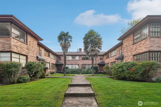 Nestled in the iconic brick Avalon building, this gracious 1-bedroom condo perfectly blends classic charm with modern updates