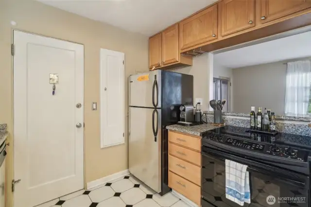 The kitchen features a convenient breakfast bar