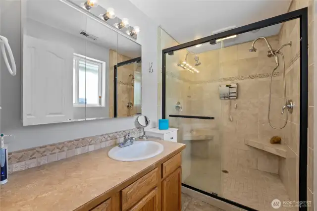 En-suite bath with spacious shower