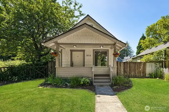 Charming Craftsman curb appeal with brand new roof, windows, gutters & fresh exterior paint!