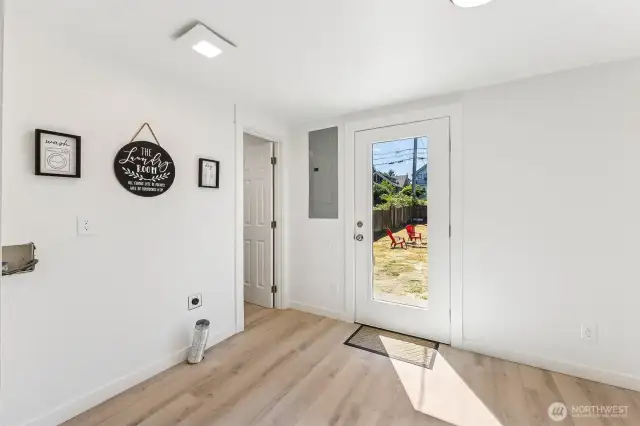 Room to fold, store, dine, or create—this utility room does it all.