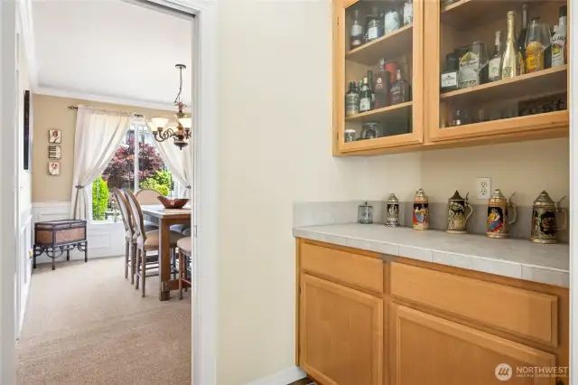 Functional butler’s pantry positioned perfectly beside the formal dining room.