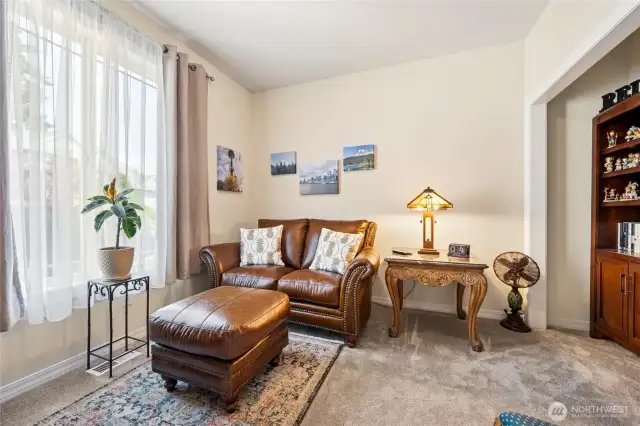This secondary bedroom is thoughtfully used as a quiet den.