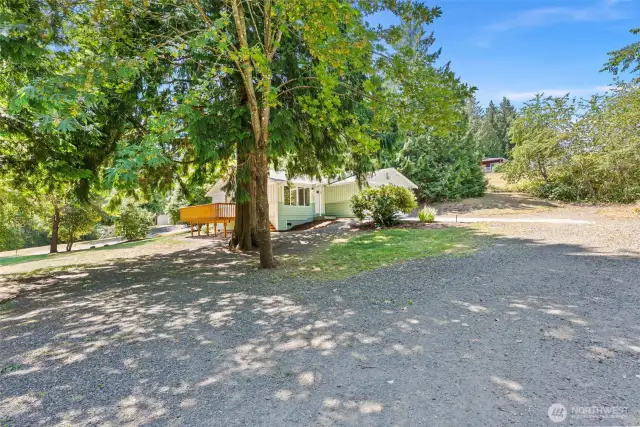 Great sunny lot with plenty of room to create garden space.
