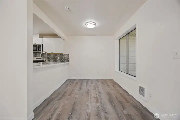 Open-concept dining area — perfect for everyday meals or entertaining.