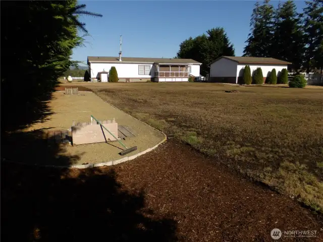 Enter your property off of Sandridge Road.  Beautiful asphault driveway. Looks great.
