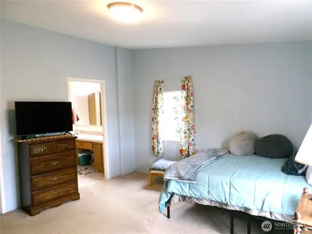 Ensuite is upon entering the house.  Just turn to the right and enter the primary bedroom with a full bath.