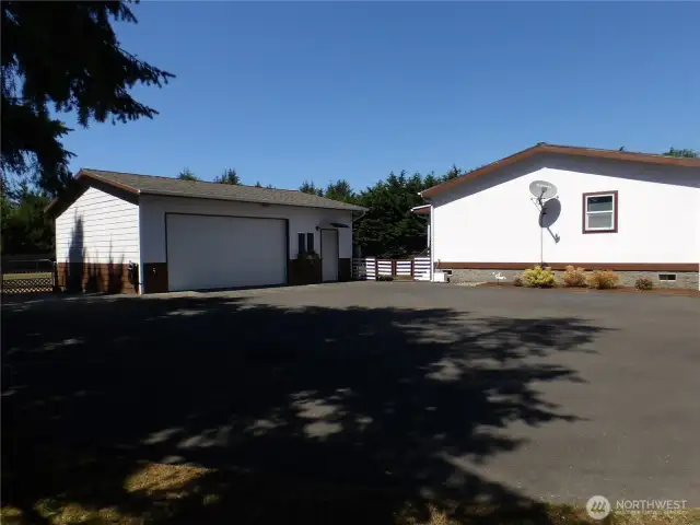 PLENTY OF PARKING.  Impressive entrance driveway with well done asphalt.