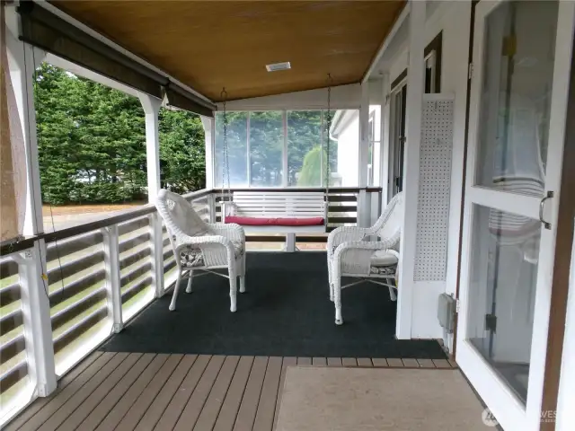 Covered enclosed porch.