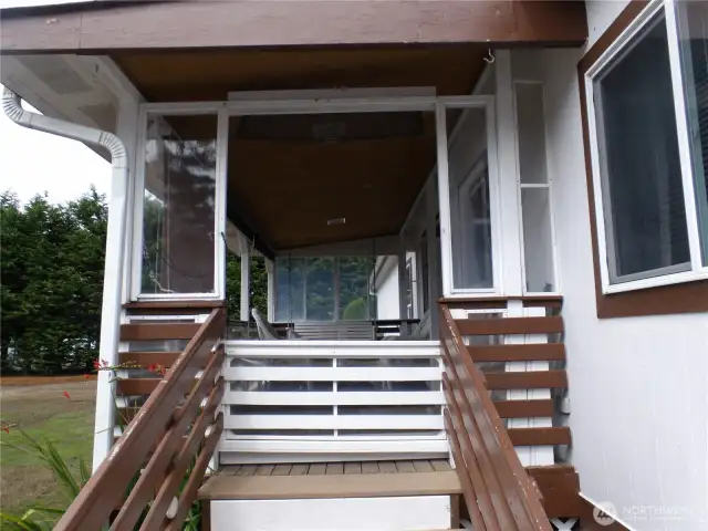 Entry to back porch next to the garage.