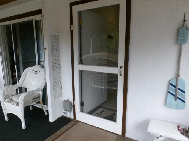 Back porch door goes directly into the laundry room.