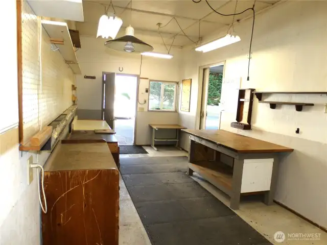 Attached and extra shop space with garage.