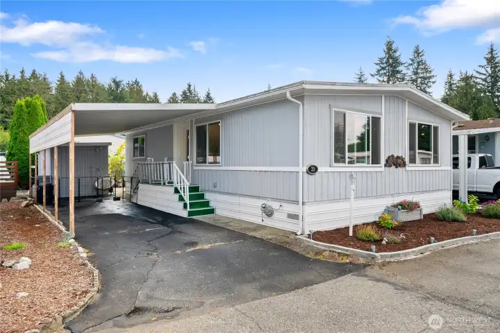 Front W/carport & shed