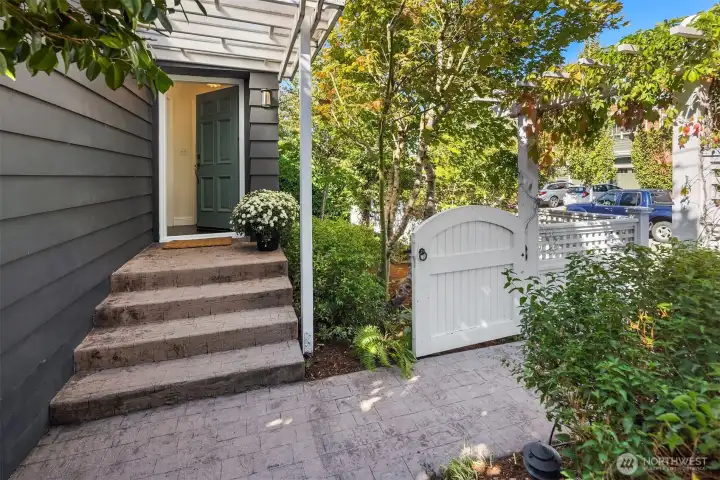 Covered front porch. Stamped concreate entry walkway.