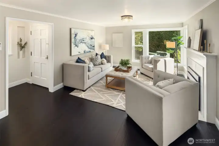 Entry w/ coat closet and wall nook.