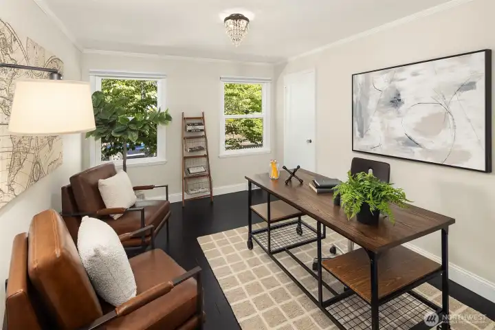 Second upstairs bedroom of 3. Currently staged as an office.