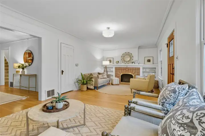 Step inside to a spacious main living room featuring two distinct lounging areas.