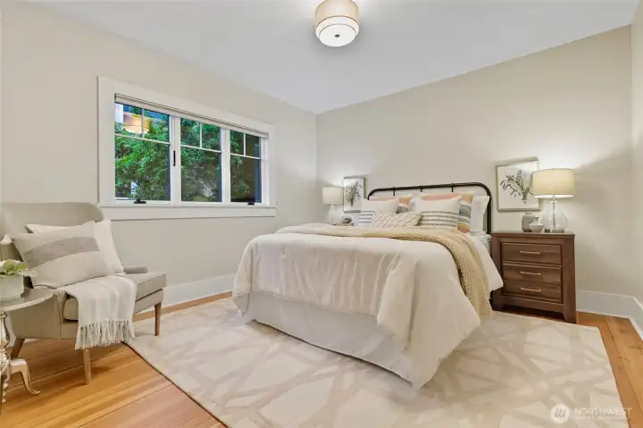 Generously sized bedroom on the main floor, offering plenty of space.