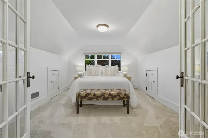 Expansive primary bedroom with plenty of room to relax.