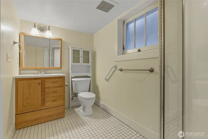 The basement is complete with a third bathroom, adding convenience and flexibility.