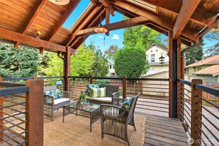 Enjoy seamless indoor-outdoor living on a covered deck and patio—truly an entertainer’s dream.