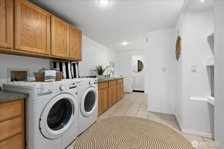 Large Utility Room with tons of storage! Convert to home office or Ensuite?