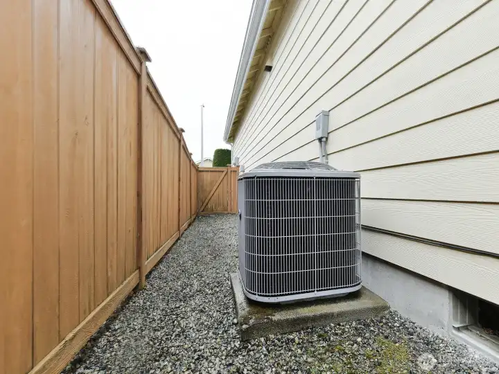 Side of yard Fenced Air conditioning too.