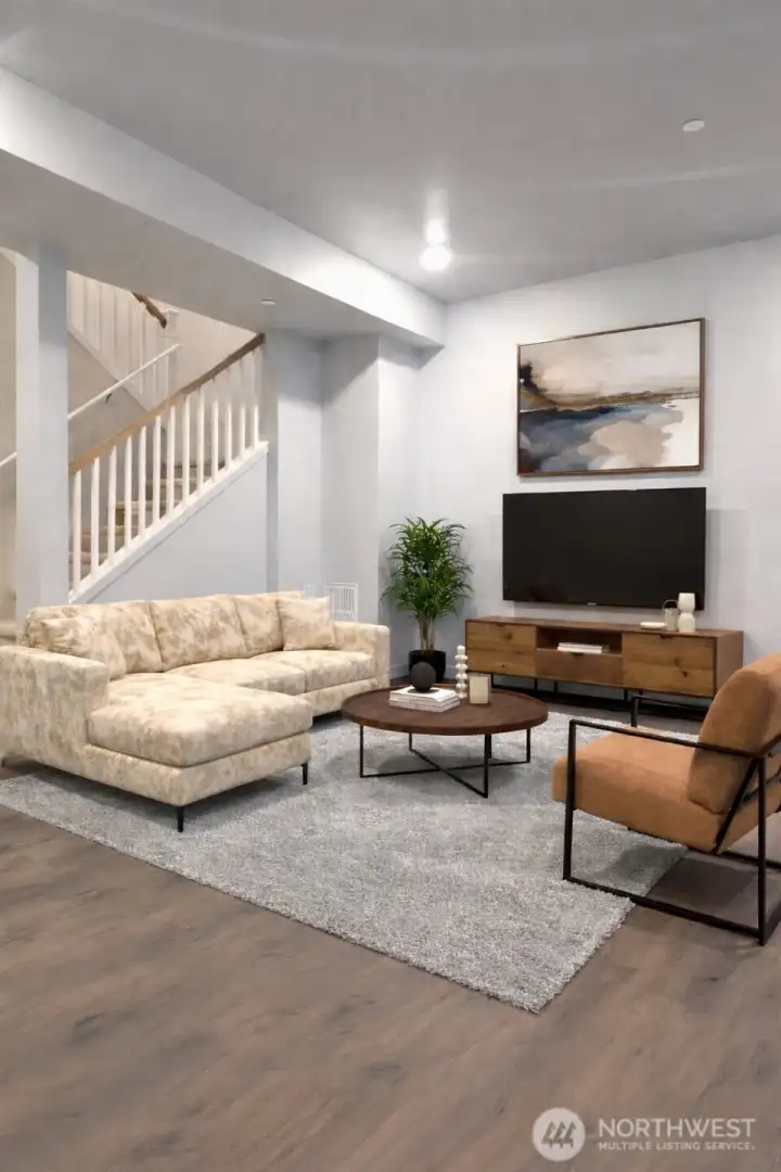 [inspirational virtual staging] Lower level recroom. This level has 2 bedrooms, full bath, and easy finish kitchenette