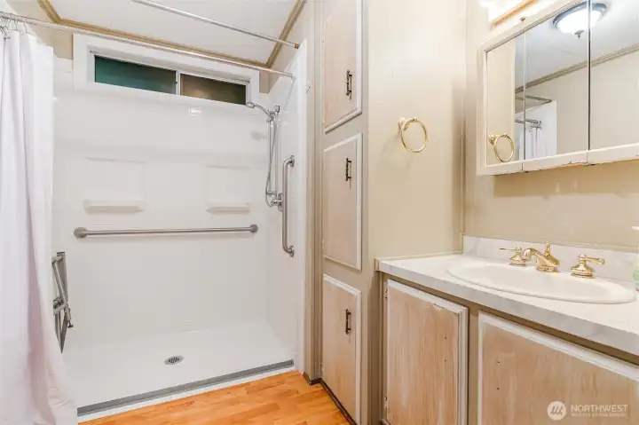 Primary Bathroom with roll in shower