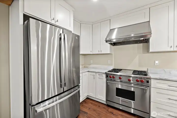 New appliances including this Wolf range & hood vent!