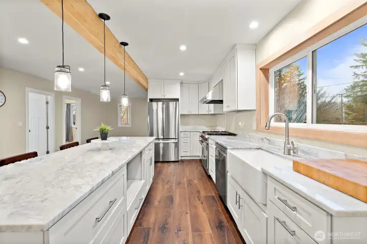 All new cabinets offering plenty of storage space! Another view of the pendant lighting over the huge island!