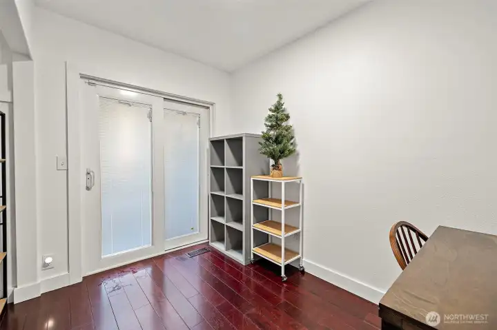 The 4th bedroom has an opaque slider to the back deck. Could possibly be used as an office/den/game room - your choice!