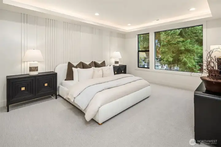 Designer primary suite with five-piece bath & heated floors