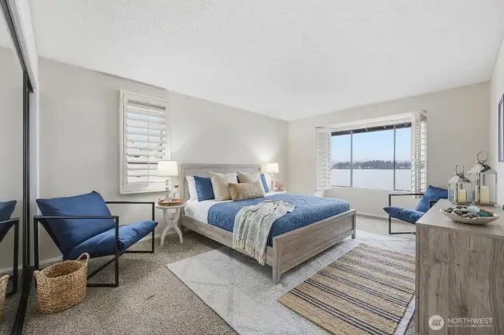 Bedroom 2 of 3 upstairs. Some items are digitally staged, some is actual staging.