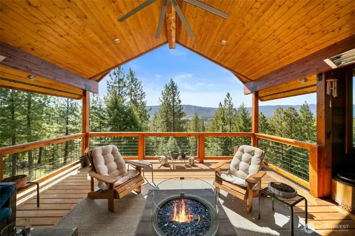 Expansive sliding doors that open to a covered, heated deck—perfect for year-round outdoor living, entertaining, and wildlife viewing